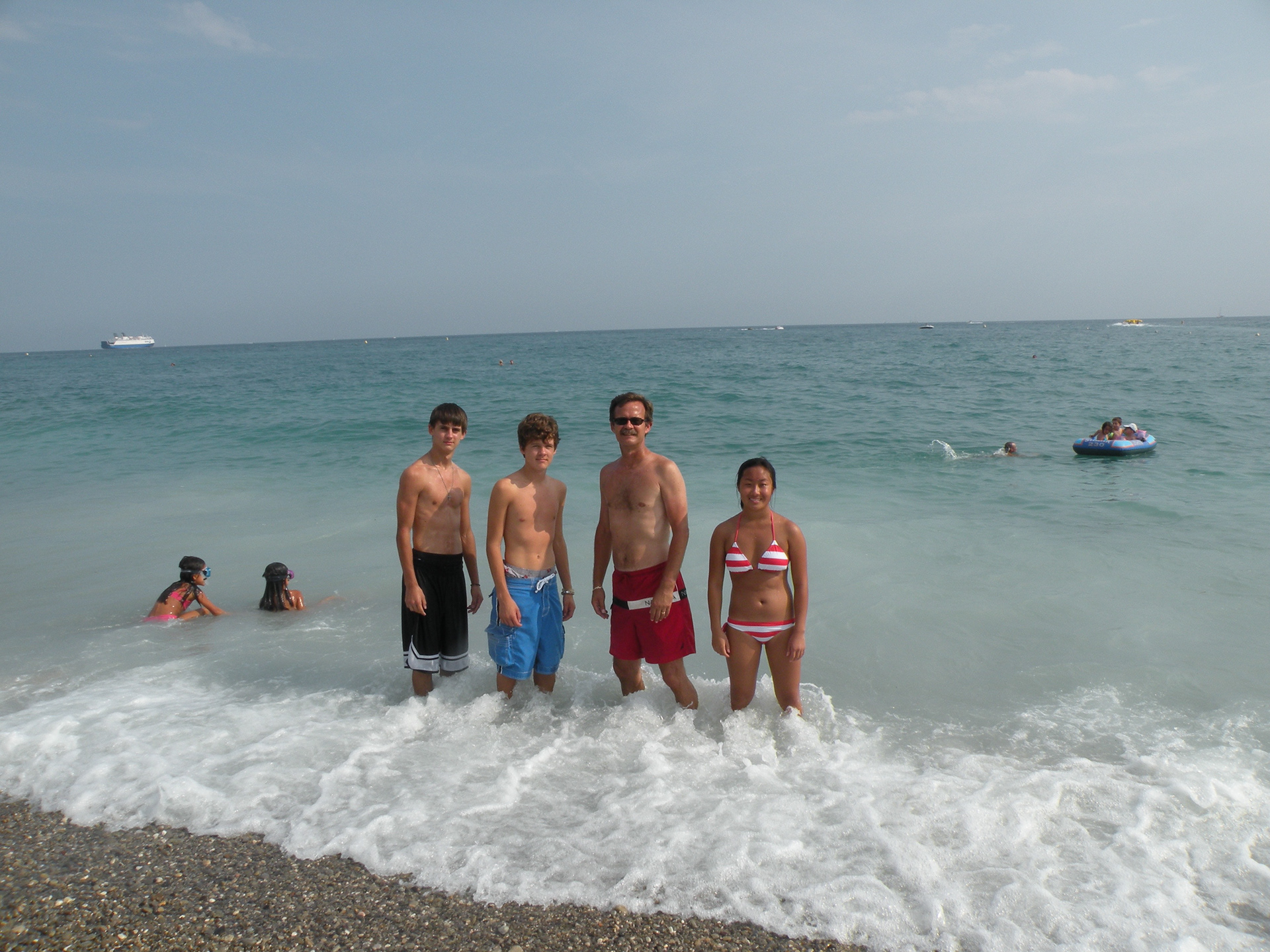 My brother, dad, sister and I enjoying the beach
