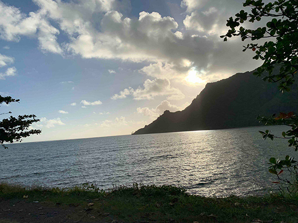 The day winds down as the sun goes to hide behind the island