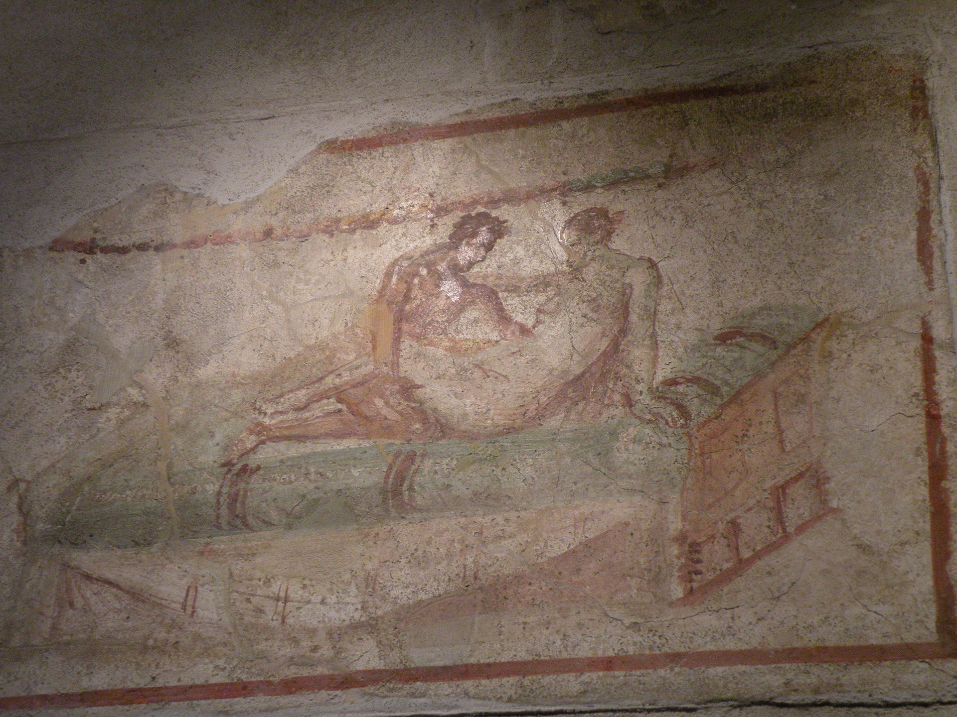 Artwork found on the walls in a crumbling building
