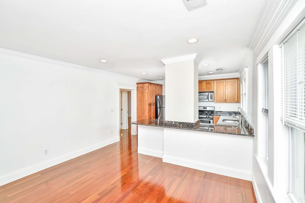 $2,800 a Month Anthony Brewster 617-930-1995 Beautiful 2 bedroom apartment in Adams Village neighborhood. Features living and dining room with cherry hardwood floors and central air conditioning. Each unit features washer and dryer within unit, Stainless steal, appliances. Off-street parking or decide to commute with easy access to public transportation and easy highway access Close to local favorites such as Greenhills Irish Bakery, Lucy's, Toohing Playground, Dog Park, Pope John Paul Park, Boston Sports Club Gym