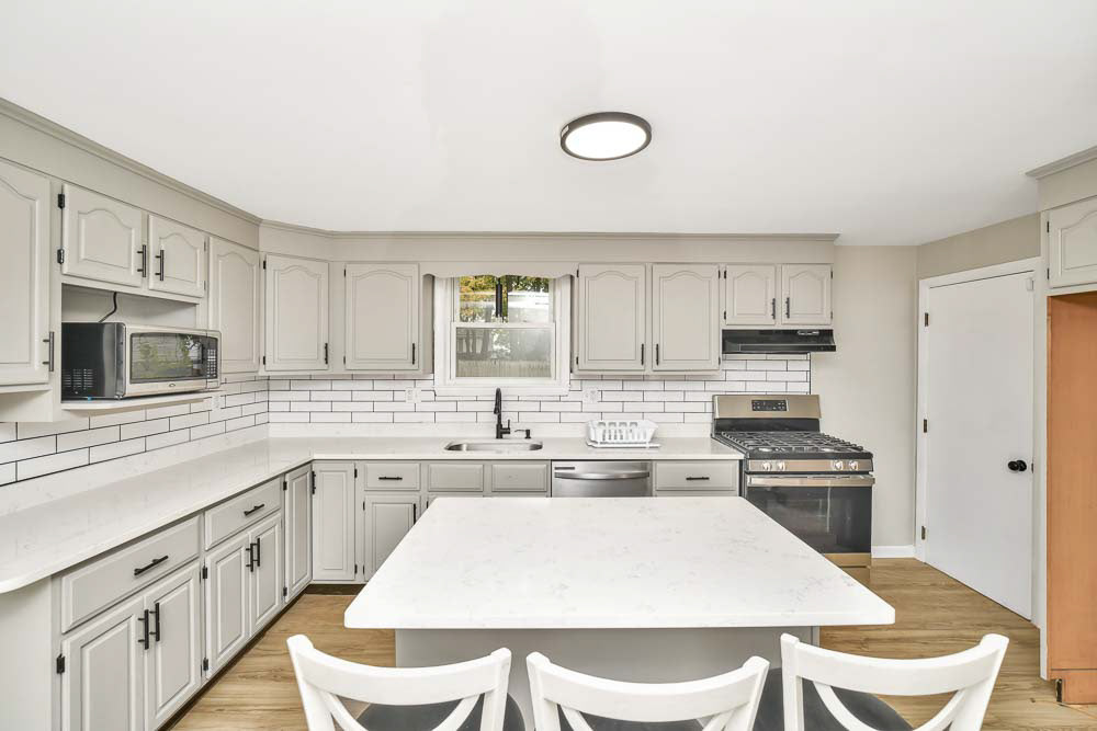Sterling Lundy Boston Trust Realty Group 508-326-3704 OPEN HOUSE CANCELLED. SELLER SAID SELL SELL SELL !!!! PRICE REDUCTION. 369K Finally a place to call home. Beautifully renovated ranch to your liking ...and ...and ITS UNDER 400,000.00 !!! This is the perfect starter home,downsizing or if you are simply looking for easy living. Over-sized fenced yard with a shed to watch the kids play or enjoy time with family and friends. With a new roof there is nothing to do but move in. The home offers 2 generous sized bedrooms and a master bedroom that has walk-in closet. It doesn't stop there .... Step inside the natural sun light open kitchen / dining floor plan with stainless steel appliances, quartz counter-tops which is also featured in the bathroom.Home is conveniently located near shopping, schools, major routes, and the commuter rail. Don't delay and miss out !!!