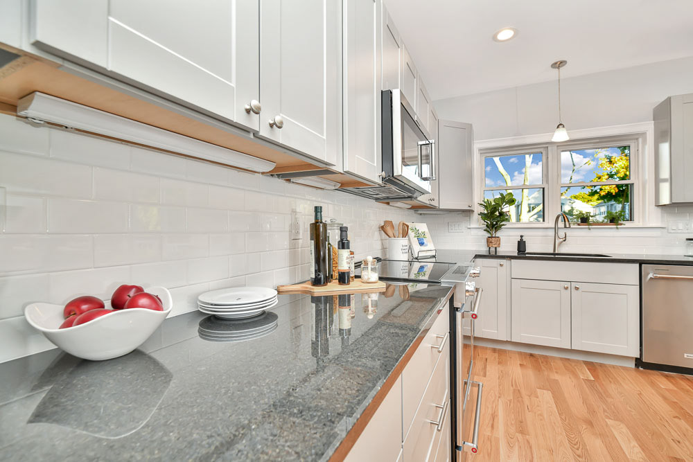 $1,290,000 Robert Nichols 617-448-5112 This Like New Construction Single Family features an open concept main level that consists of dining area, living room, ½ bath and beautifully designed kitchen that includes Stainless steel Kitchen Aid appliances. The space is perfect for entertaining. The second level features 3 bedrooms and two full bathrooms. One of the bedrooms on this level is an ensuite that could easily serve as a home office or guest bedroom. The third level is comprised of the primary suite. It includes a spacious bedroom, private enclosed balcony overlooking Hickey Park, a large walk in closet, skylights and a large bathroom. This home is finished with new lighting, fixture, hardwood flooring throughout and a large basement that can easily be finished and provides direct access to the large rear yard. This home was designed for optimal enjoyment and entertainment. It is conveniently located close to public transportation and is accessible to Assembly Row, Middlesex Fells Reservation, and Medford Square.