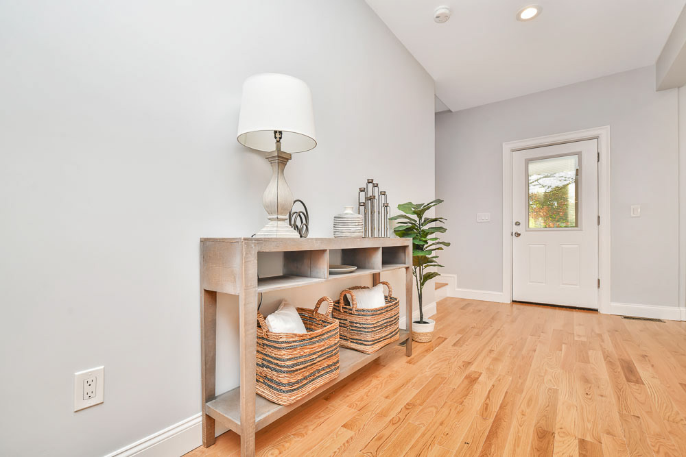 $1,290,000 Robert Nichols 617-448-5112 This Like New Construction Single Family features an open concept main level that consists of dining area, living room, ½ bath and beautifully designed kitchen that includes Stainless steel Kitchen Aid appliances. The space is perfect for entertaining. The second level features 3 bedrooms and two full bathrooms. One of the bedrooms on this level is an ensuite that could easily serve as a home office or guest bedroom. The third level is comprised of the primary suite. It includes a spacious bedroom, private enclosed balcony overlooking Hickey Park, a large walk in closet, skylights and a large bathroom. This home is finished with new lighting, fixture, hardwood flooring throughout and a large basement that can easily be finished and provides direct access to the large rear yard. This home was designed for optimal enjoyment and entertainment. It is conveniently located close to public transportation and is accessible to Assembly Row, Middlesex Fells Reservation, and Medford Square.