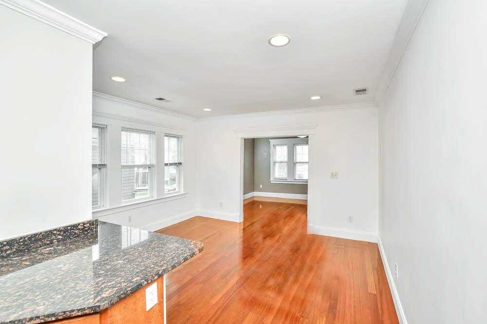 $2,800 a Month Anthony Brewster 617-930-1995 Beautiful 2 bedroom apartment in Adams Village neighborhood. Features living and dining room with cherry hardwood floors and central air conditioning. Each unit features washer and dryer within unit, Stainless steal, appliances. Off-street parking or decide to commute with easy access to public transportation and easy highway access Close to local favorites such as Greenhills Irish Bakery, Lucy's, Toohing Playground, Dog Park, Pope John Paul Park, Boston Sports Club Gym