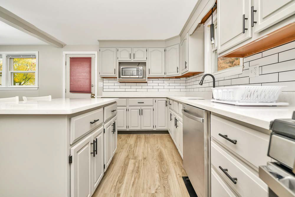 Sterling Lundy Boston Trust Realty Group 508-326-3704 OPEN HOUSE CANCELLED. SELLER SAID SELL SELL SELL !!!! PRICE REDUCTION. 369K Finally a place to call home. Beautifully renovated ranch to your liking ...and ...and ITS UNDER 400,000.00 !!! This is the perfect starter home,downsizing or if you are simply looking for easy living. Over-sized fenced yard with a shed to watch the kids play or enjoy time with family and friends. With a new roof there is nothing to do but move in. The home offers 2 generous sized bedrooms and a master bedroom that has walk-in closet. It doesn't stop there .... Step inside the natural sun light open kitchen / dining floor plan with stainless steel appliances, quartz counter-tops which is also featured in the bathroom.Home is conveniently located near shopping, schools, major routes, and the commuter rail. Don't delay and miss out !!!
