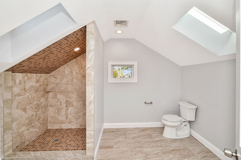 $1,290,000 Robert Nichols 617-448-5112 This Like New Construction Single Family features an open concept main level that consists of dining area, living room, ½ bath and beautifully designed kitchen that includes Stainless steel Kitchen Aid appliances. The space is perfect for entertaining. The second level features 3 bedrooms and two full bathrooms. One of the bedrooms on this level is an ensuite that could easily serve as a home office or guest bedroom. The third level is comprised of the primary suite. It includes a spacious bedroom, private enclosed balcony overlooking Hickey Park, a large walk in closet, skylights and a large bathroom. This home is finished with new lighting, fixture, hardwood flooring throughout and a large basement that can easily be finished and provides direct access to the large rear yard. This home was designed for optimal enjoyment and entertainment. It is conveniently located close to public transportation and is accessible to Assembly Row, Middlesex Fells Reservation, and Medford Square.
