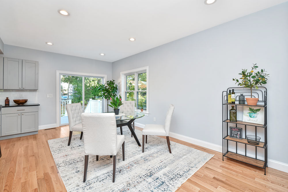 $1,290,000 Robert Nichols 617-448-5112 This Like New Construction Single Family features an open concept main level that consists of dining area, living room, ½ bath and beautifully designed kitchen that includes Stainless steel Kitchen Aid appliances. The space is perfect for entertaining. The second level features 3 bedrooms and two full bathrooms. One of the bedrooms on this level is an ensuite that could easily serve as a home office or guest bedroom. The third level is comprised of the primary suite. It includes a spacious bedroom, private enclosed balcony overlooking Hickey Park, a large walk in closet, skylights and a large bathroom. This home is finished with new lighting, fixture, hardwood flooring throughout and a large basement that can easily be finished and provides direct access to the large rear yard. This home was designed for optimal enjoyment and entertainment. It is conveniently located close to public transportation and is accessible to Assembly Row, Middlesex Fells Reservation, and Medford Square.