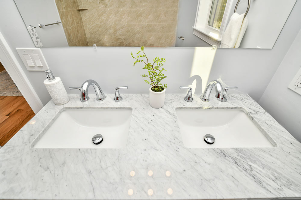 $1,290,000 Robert Nichols 617-448-5112 This Like New Construction Single Family features an open concept main level that consists of dining area, living room, ½ bath and beautifully designed kitchen that includes Stainless steel Kitchen Aid appliances. The space is perfect for entertaining. The second level features 3 bedrooms and two full bathrooms. One of the bedrooms on this level is an ensuite that could easily serve as a home office or guest bedroom. The third level is comprised of the primary suite. It includes a spacious bedroom, private enclosed balcony overlooking Hickey Park, a large walk in closet, skylights and a large bathroom. This home is finished with new lighting, fixture, hardwood flooring throughout and a large basement that can easily be finished and provides direct access to the large rear yard. This home was designed for optimal enjoyment and entertainment. It is conveniently located close to public transportation and is accessible to Assembly Row, Middlesex Fells Reservation, and Medford Square.