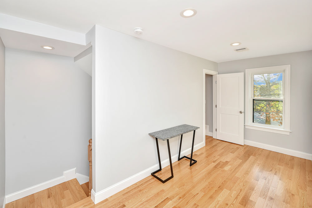 $1,290,000 Robert Nichols 617-448-5112 This Like New Construction Single Family features an open concept main level that consists of dining area, living room, ½ bath and beautifully designed kitchen that includes Stainless steel Kitchen Aid appliances. The space is perfect for entertaining. The second level features 3 bedrooms and two full bathrooms. One of the bedrooms on this level is an ensuite that could easily serve as a home office or guest bedroom. The third level is comprised of the primary suite. It includes a spacious bedroom, private enclosed balcony overlooking Hickey Park, a large walk in closet, skylights and a large bathroom. This home is finished with new lighting, fixture, hardwood flooring throughout and a large basement that can easily be finished and provides direct access to the large rear yard. This home was designed for optimal enjoyment and entertainment. It is conveniently located close to public transportation and is accessible to Assembly Row, Middlesex Fells Reservation, and Medford Square.