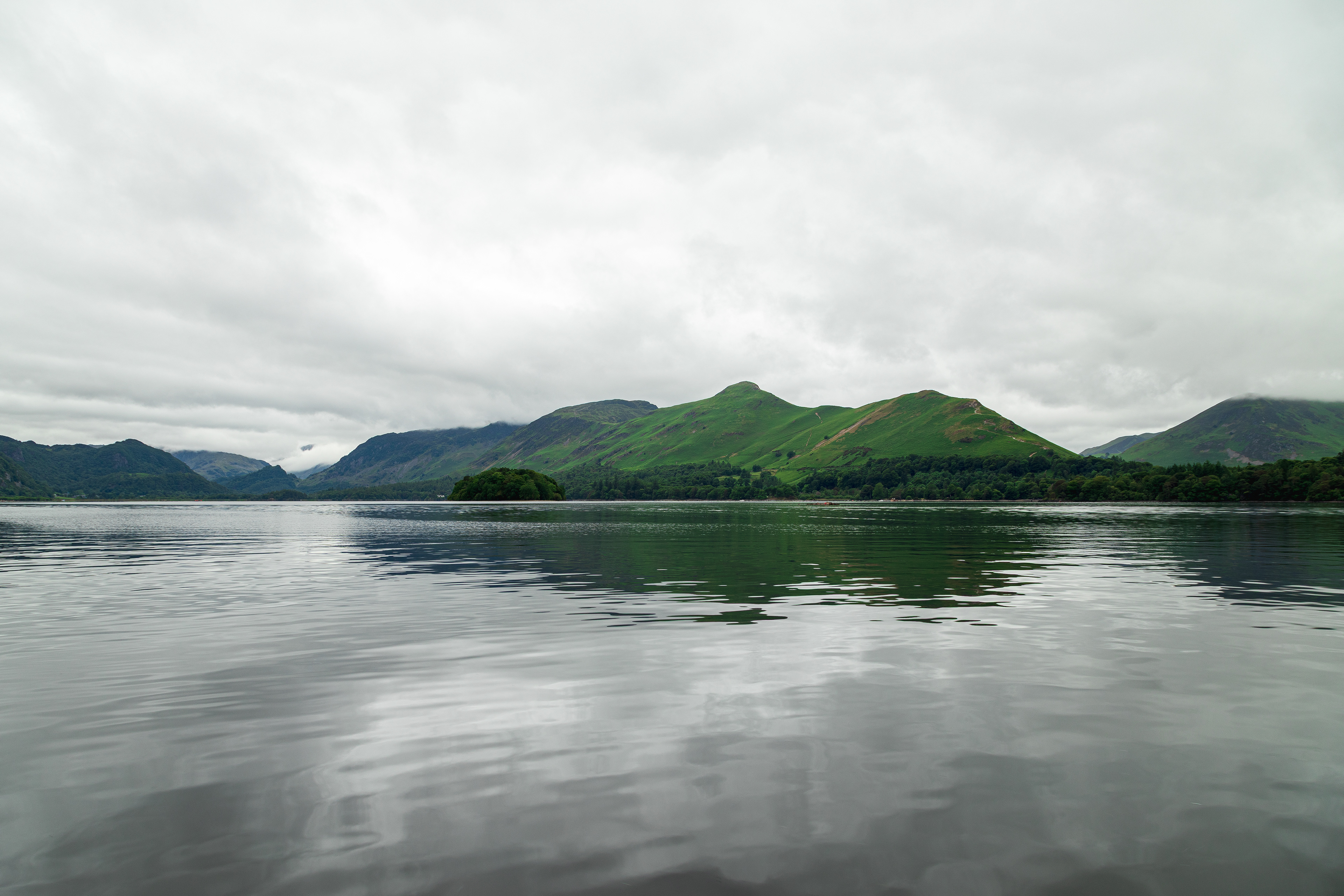 Colour view over Derwent Water with dramatic clouds
