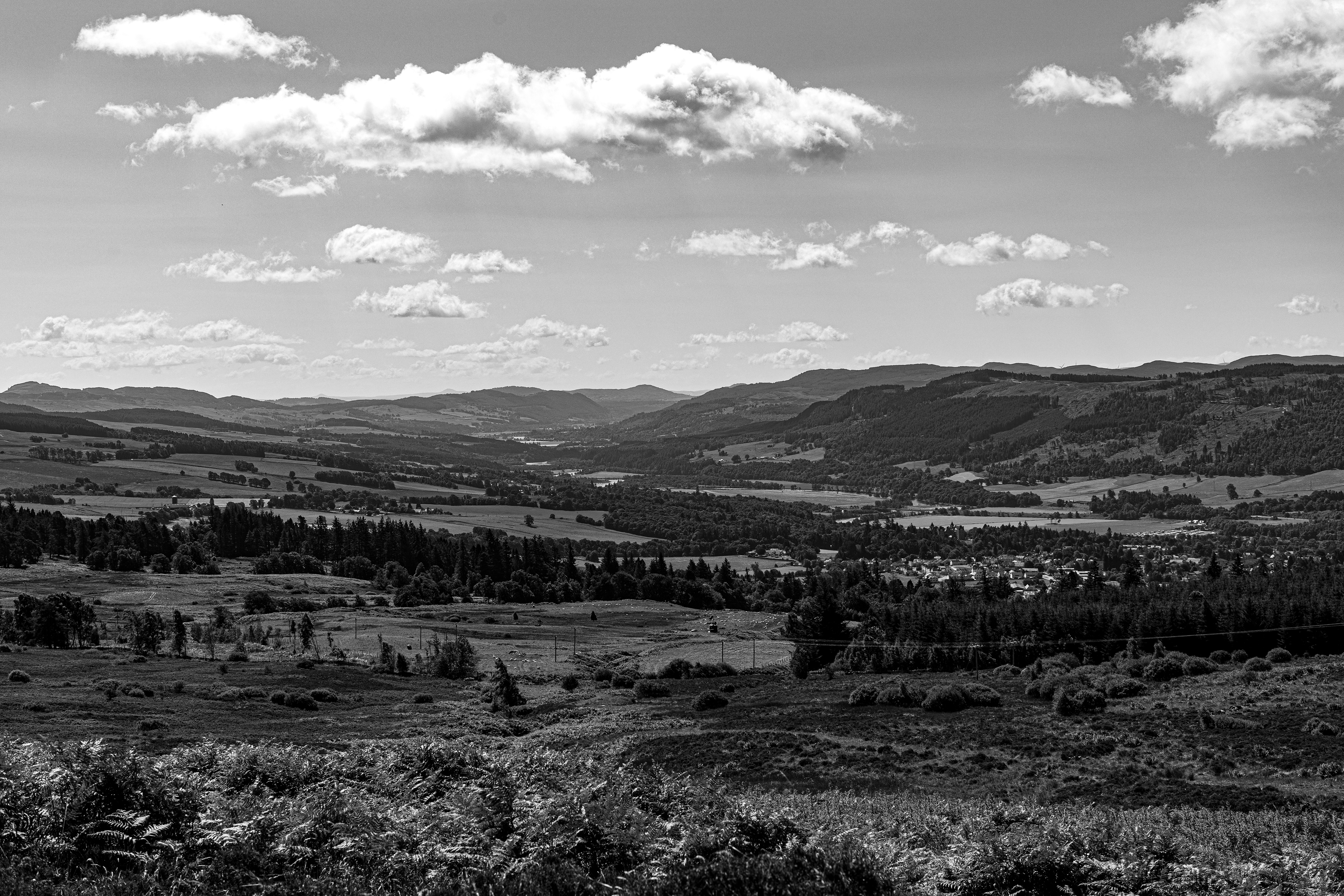 Black and white landscape shot looking down the River Tummel