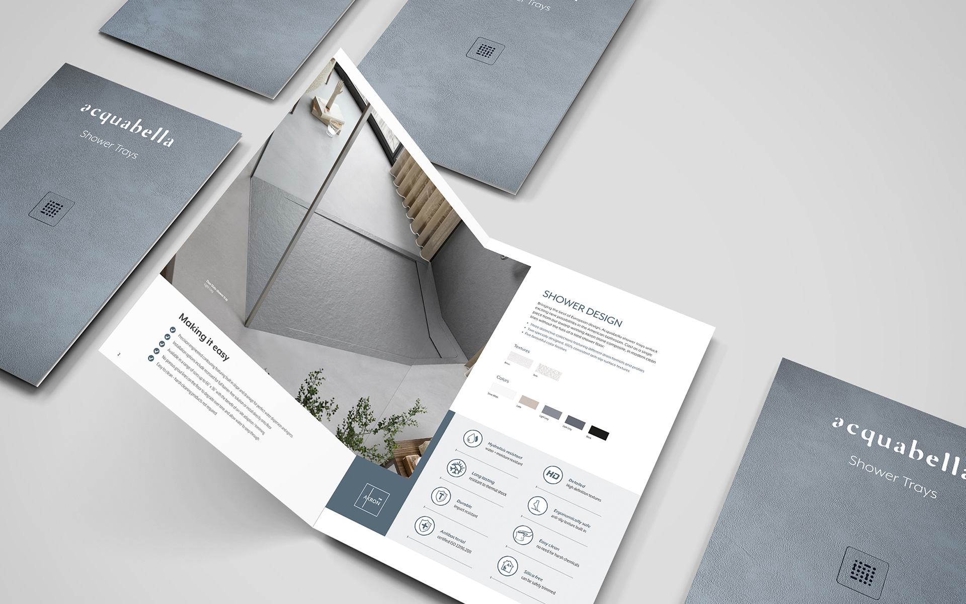 acquabella Shower Tray brochure. Contents include the full range of trays, sizes, and finishes available.