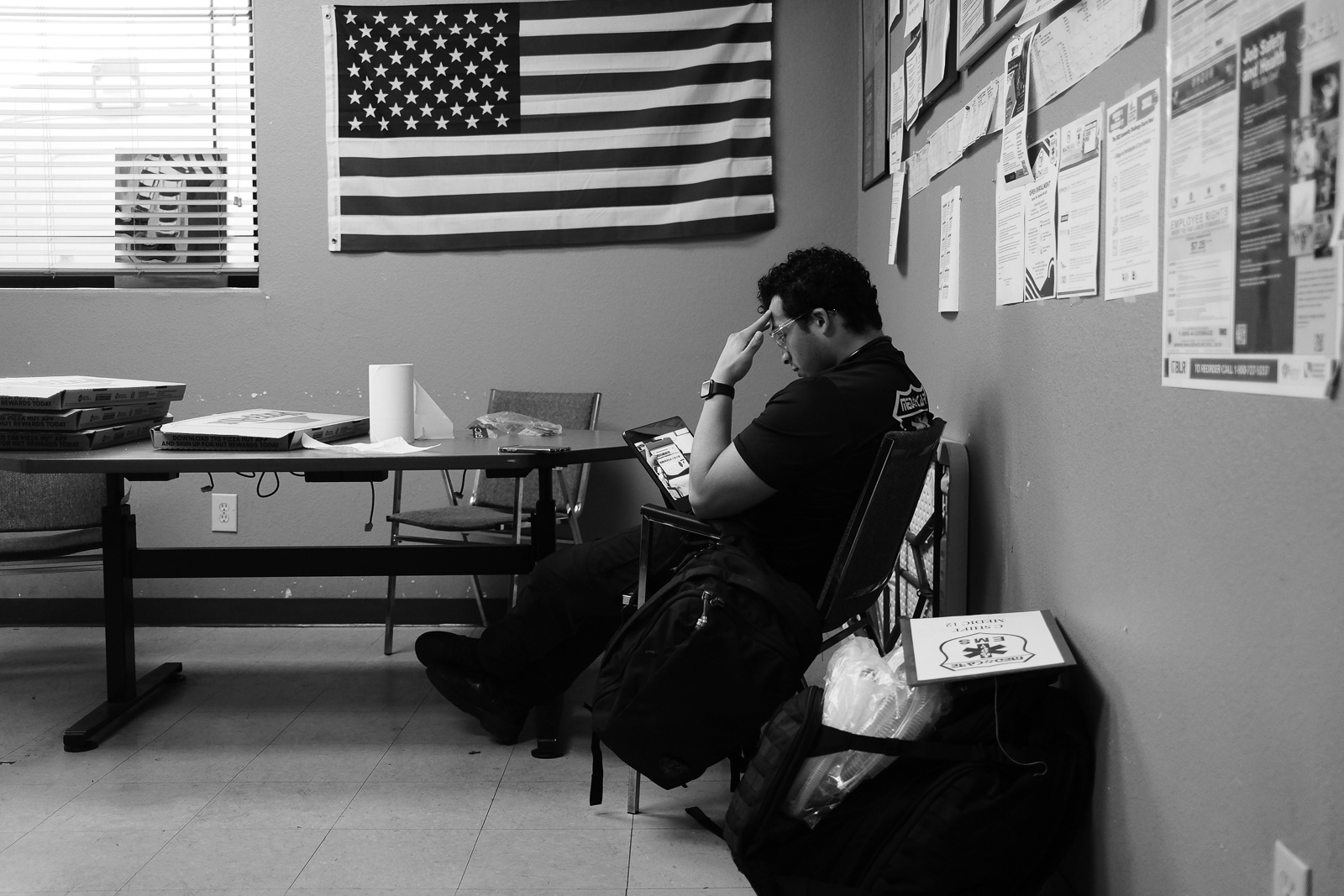 Joel studies while he waits for his truck to arrive to start his shift.