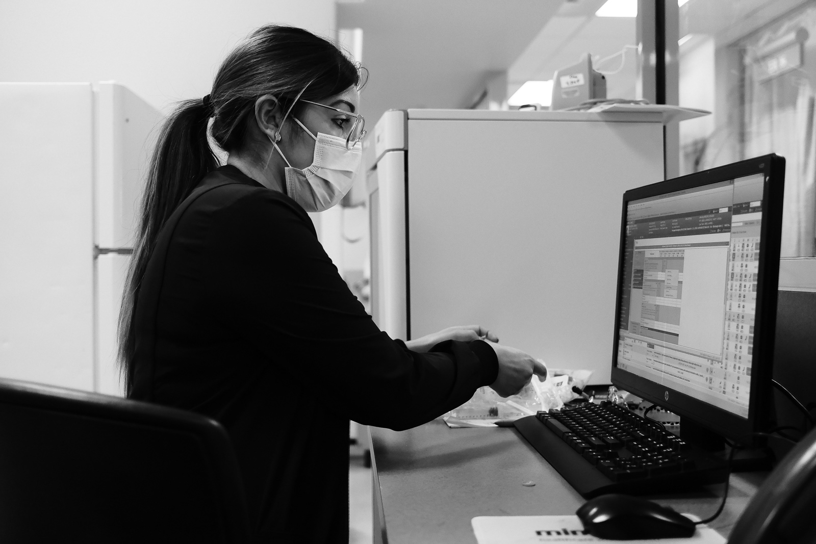 Nurse Cassy preparing medication for her patient.