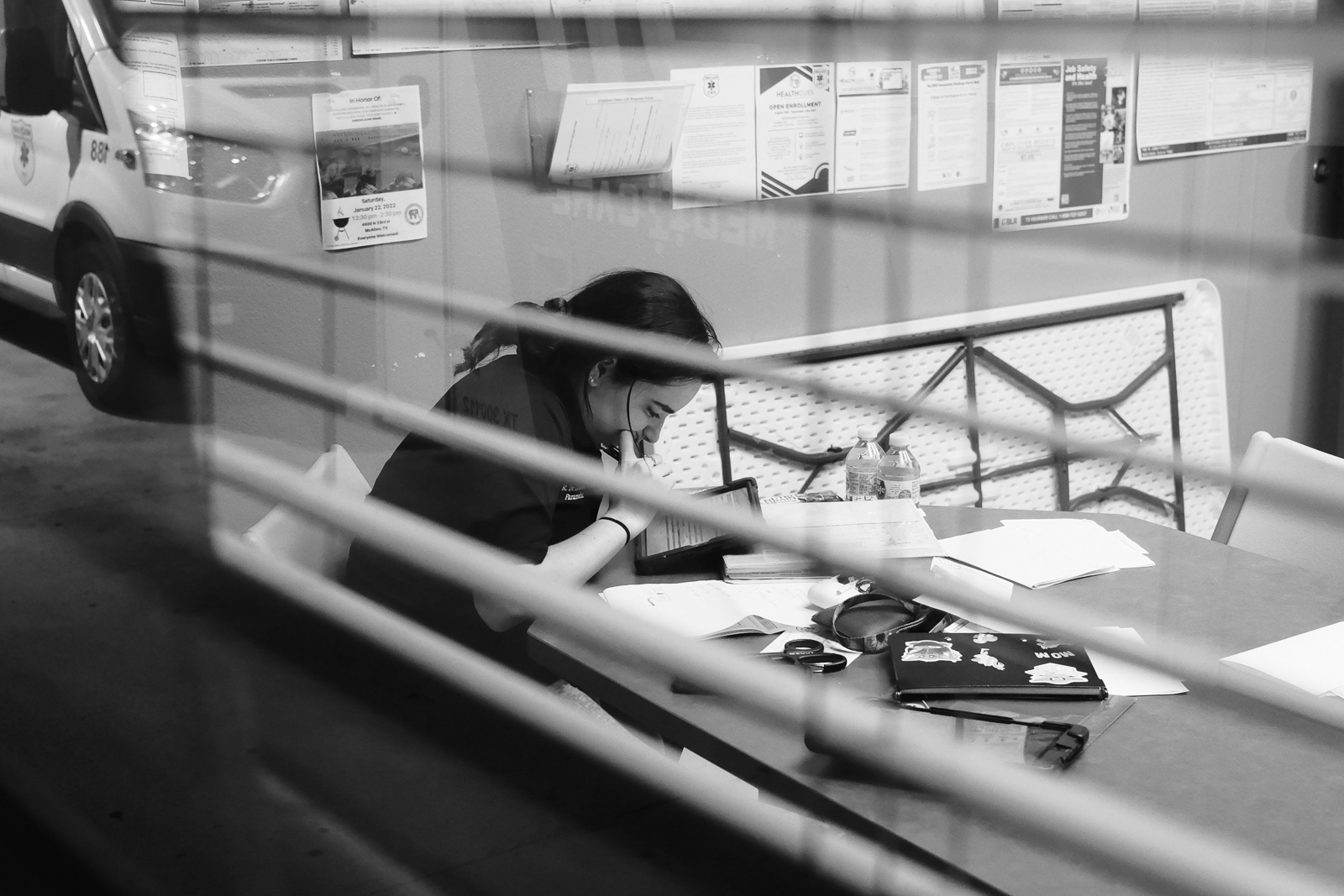 She works on her reports.