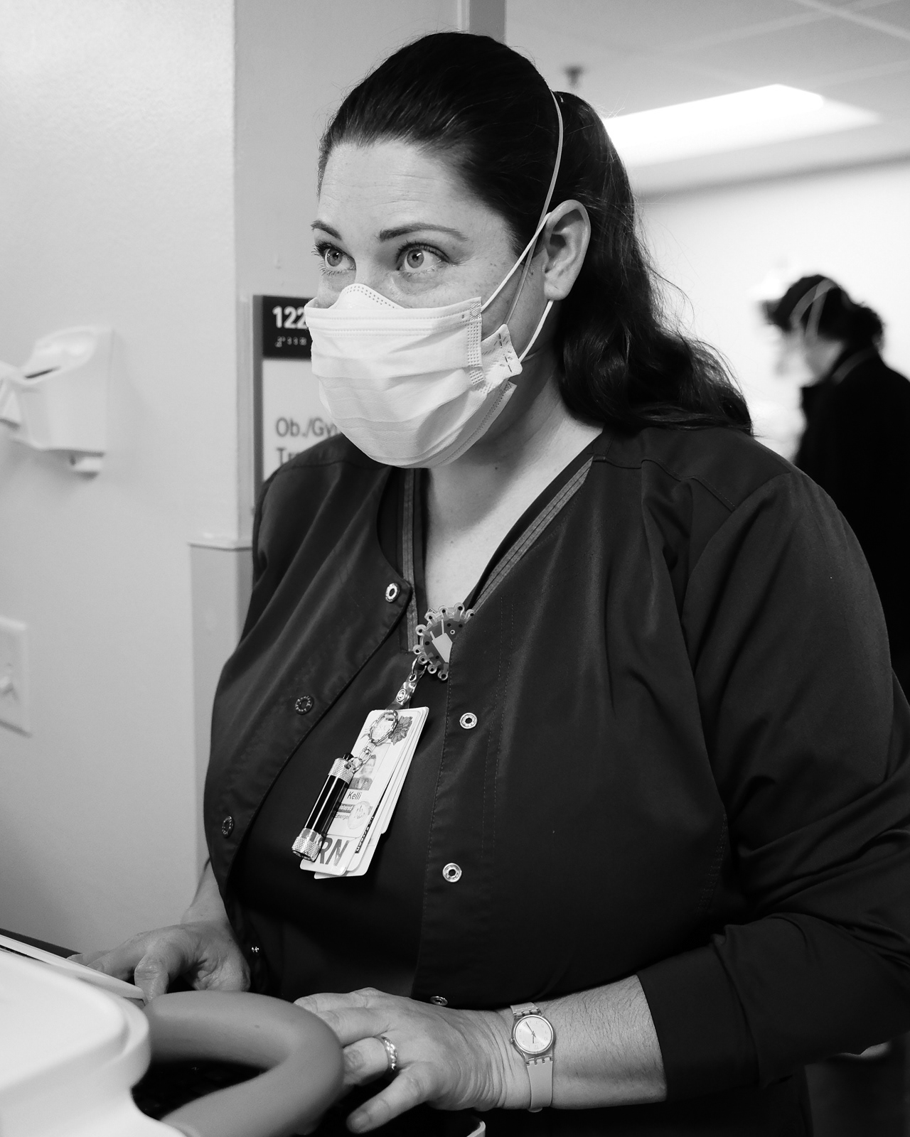 Nurse Keli, RN, with 8 years of service.