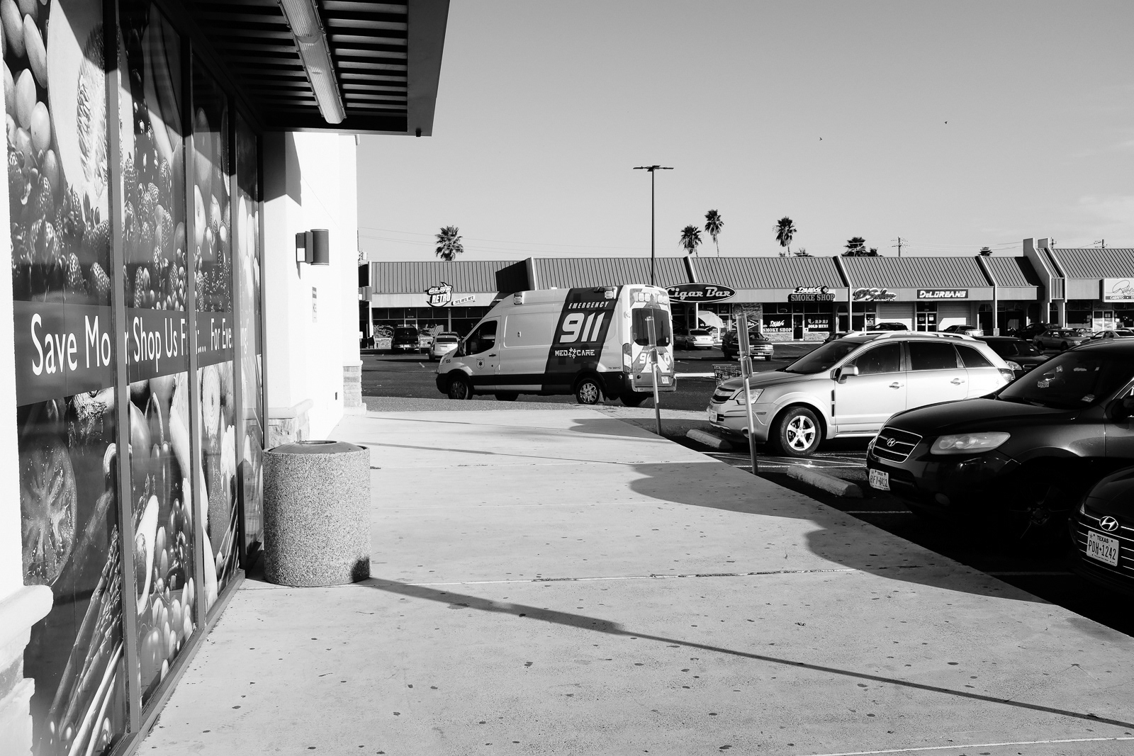 Fueling up with snacks at a local grocery store, parking at an accessible area to respond to a call.
