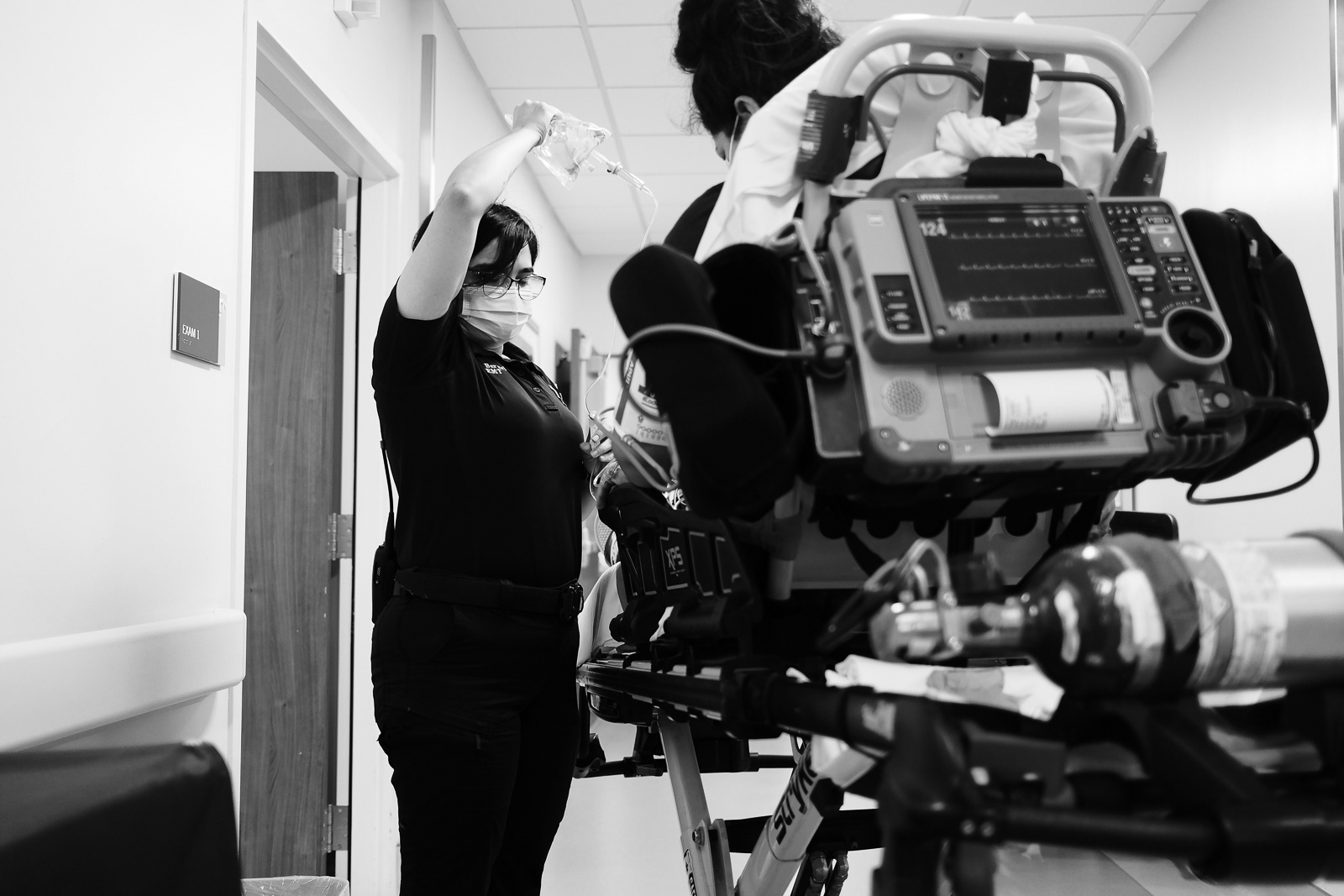 Hydrating Pt at a high flow rate. She uses forearm strength to bolus.