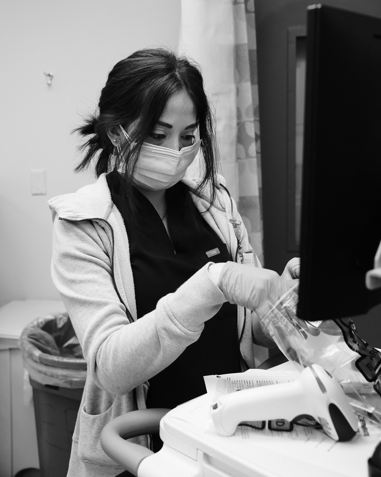 Nurse Vanessa collects blood vials.