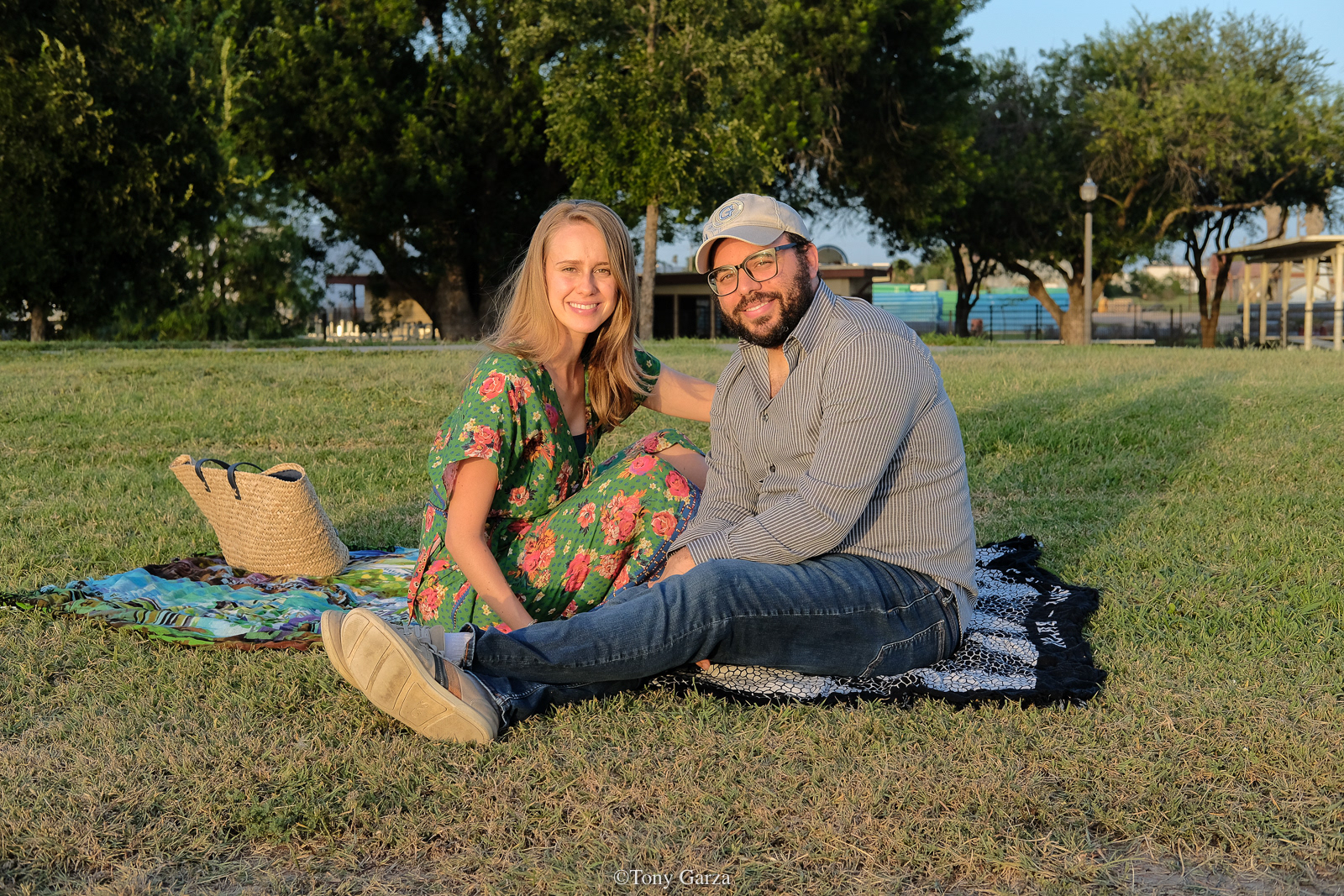 A couple having an evening picnic at the park, McAllen, Texas, July 2020.