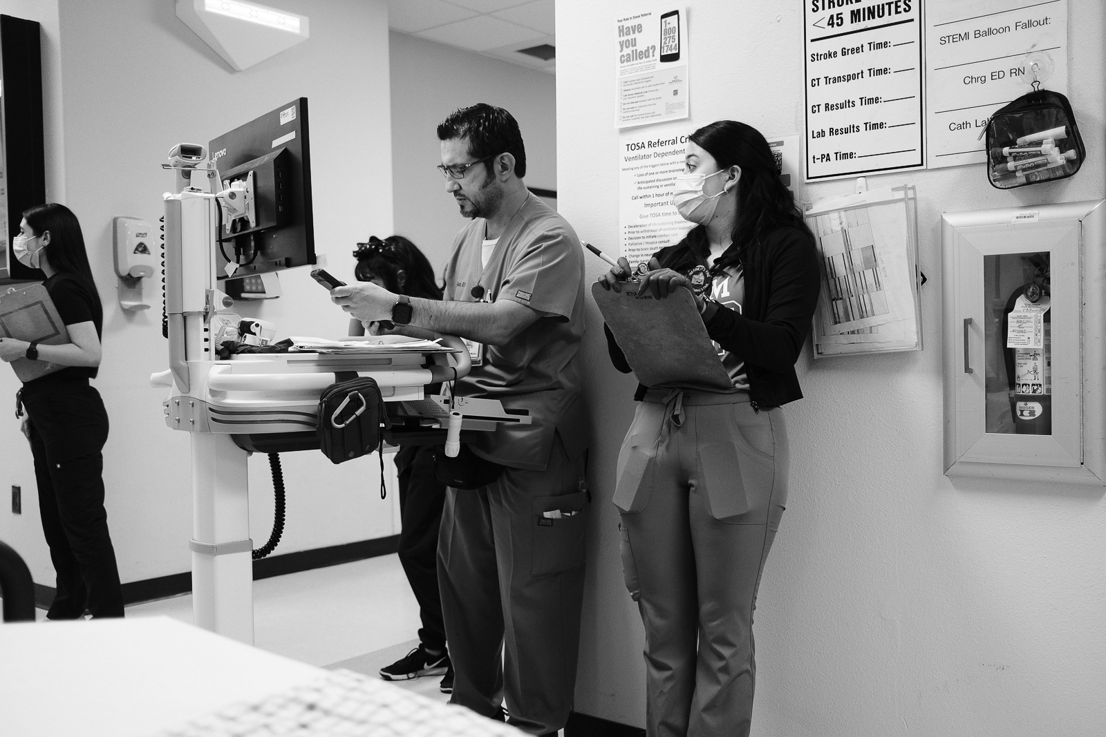 Charge Nurse Adrian and Nurse Regina wait for the stroke via EMS to arrive.