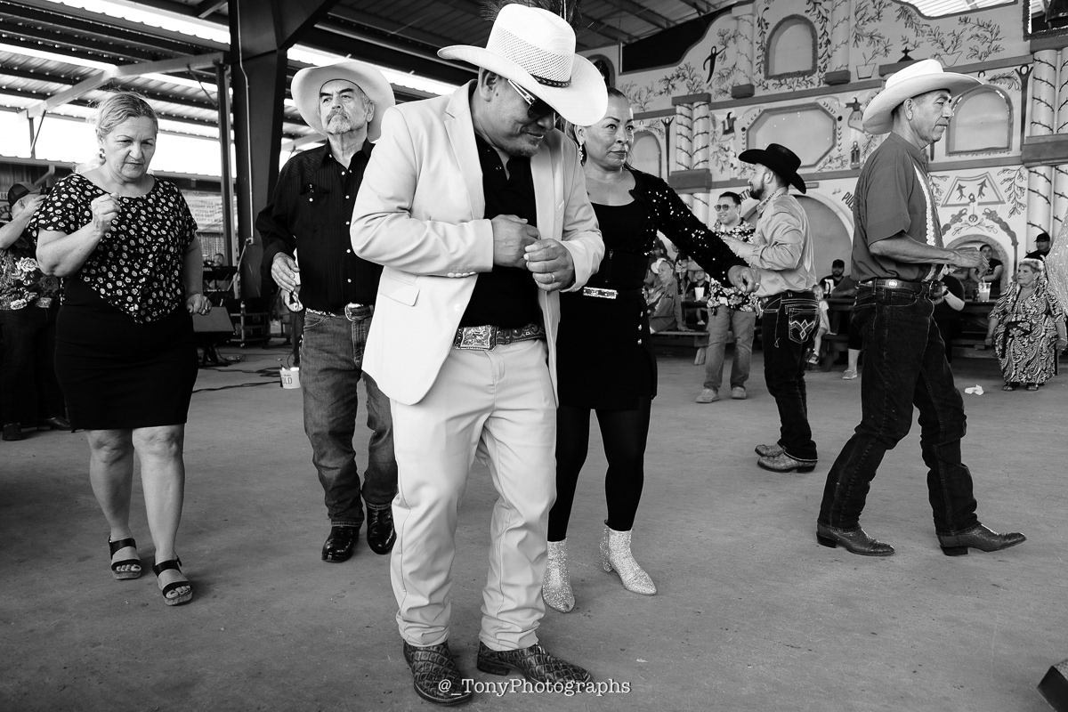 People dancing at the Alamo pulga in Texas. 