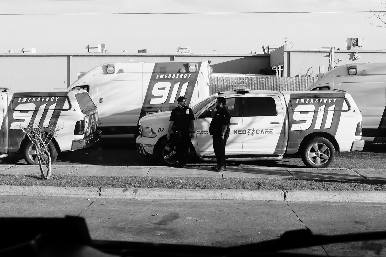 J. Montalvo, Licensed Paramedic and Rescue, talks to a co-worker and has himself a smoke before starting the shift.