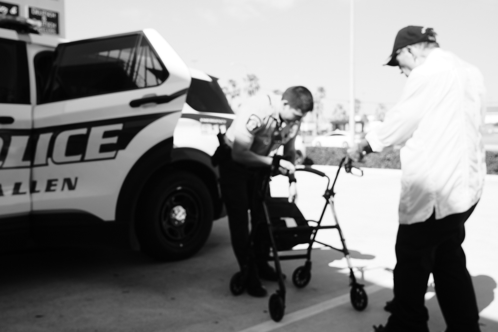 Officer helping a citizen get home.
