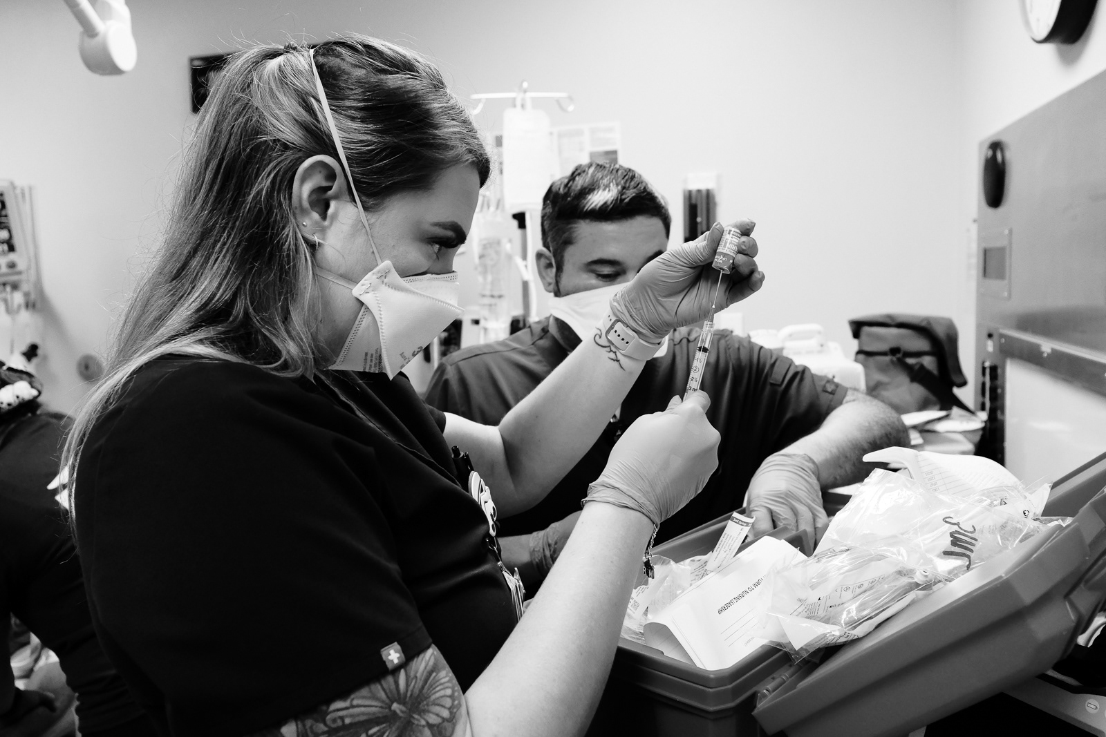She calmly inserts, without shaking, the needle attached to the syringe into the vial and draws out the precise dosage in a critical moment when the patient’s life depends on it. Only certain human's have this impeccable skill to stay calm under high stress situations.
