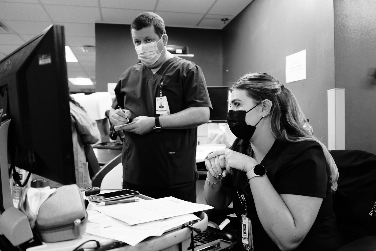 Nurse Amanda, at the end of shift, giving report to the nurse covering night shift.