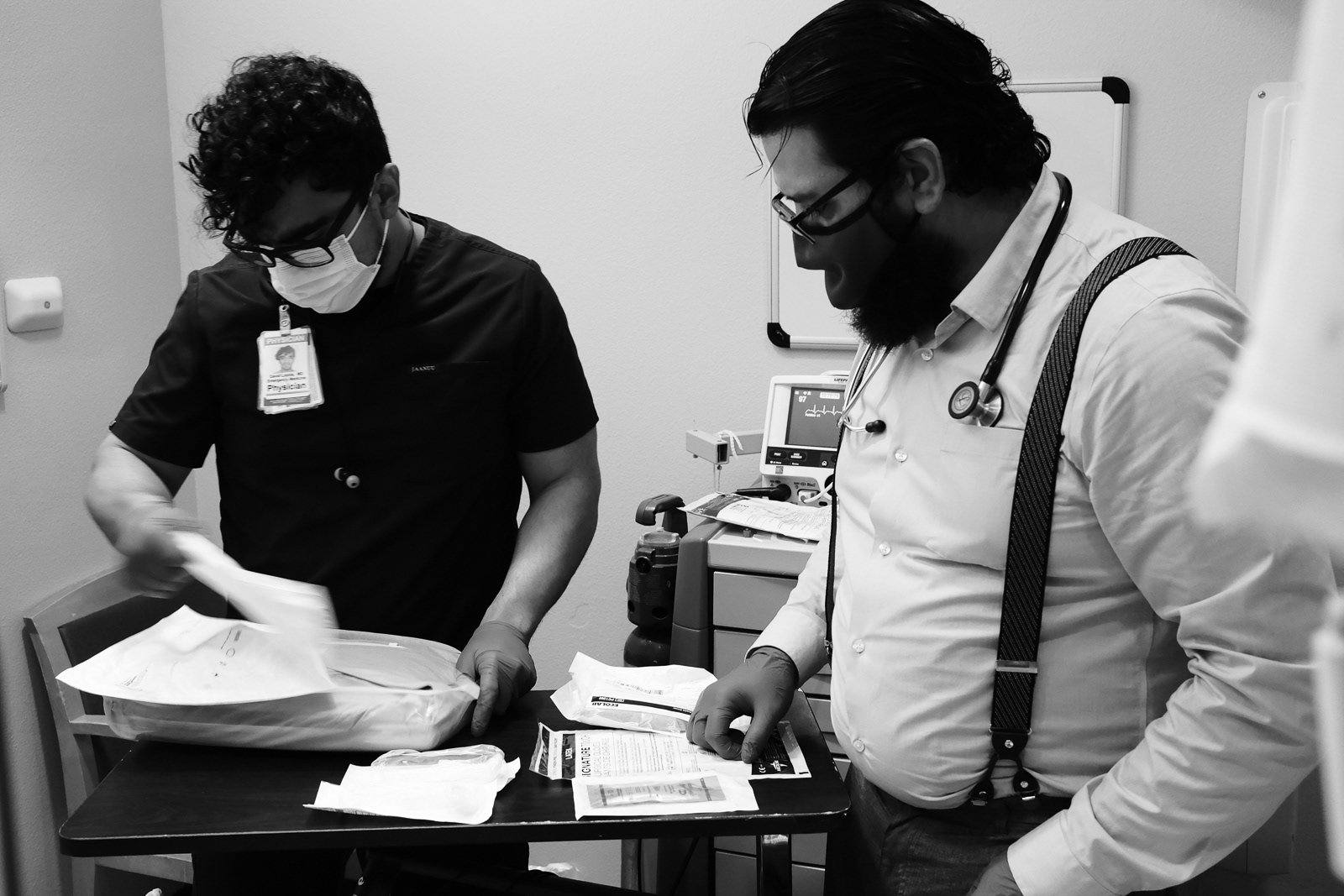 Resident doctor(right) follows Dr. Loyola (left) today.