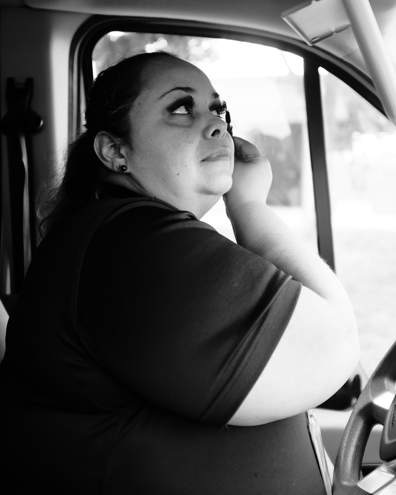 She touches up her made eye lashes. One of many worries women in EMS worry about, their war face.