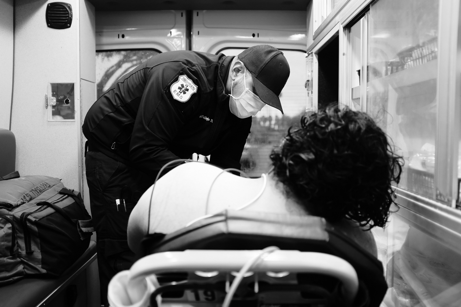 My partner helping me assess the patient.