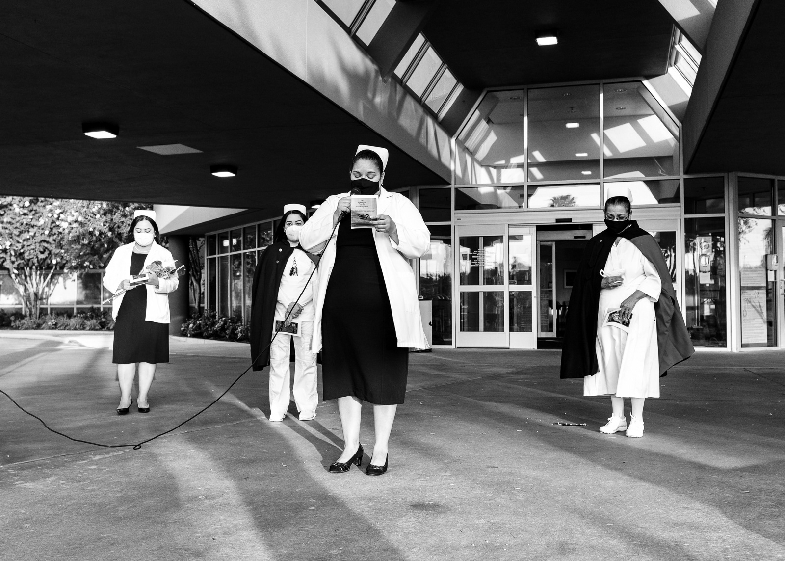 Hero’s Farewell: Nurse Honor Guard performs the Nightingale Tribute in front of McAllen Medical Center Hospital. In honor of Lorenza “Lori” Guerrero, fallen to Covid-19, and releasing her from her nursing duties.