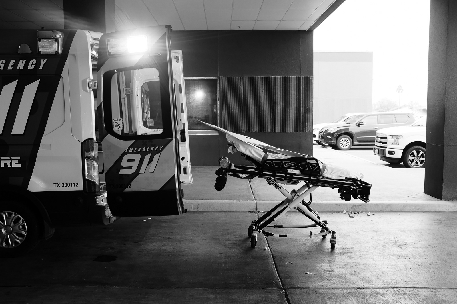 My partner decons the equipment after a call as I finish the report.