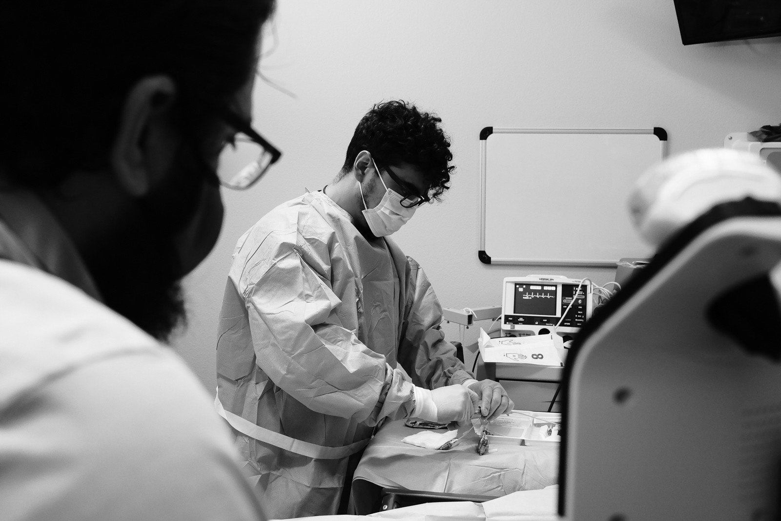 Dr Loyola prepares to place a central line.