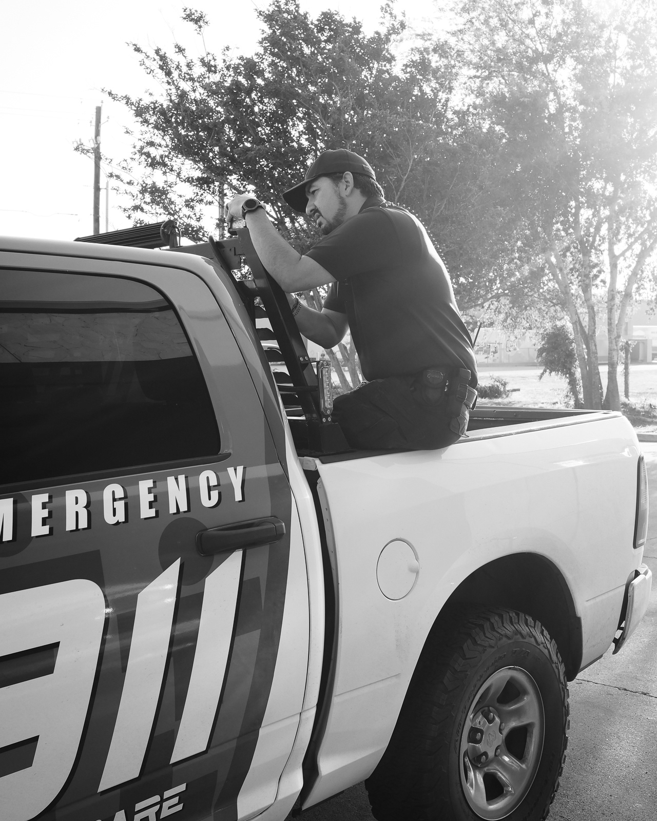 Jesse reparing his rescue truck during shift.