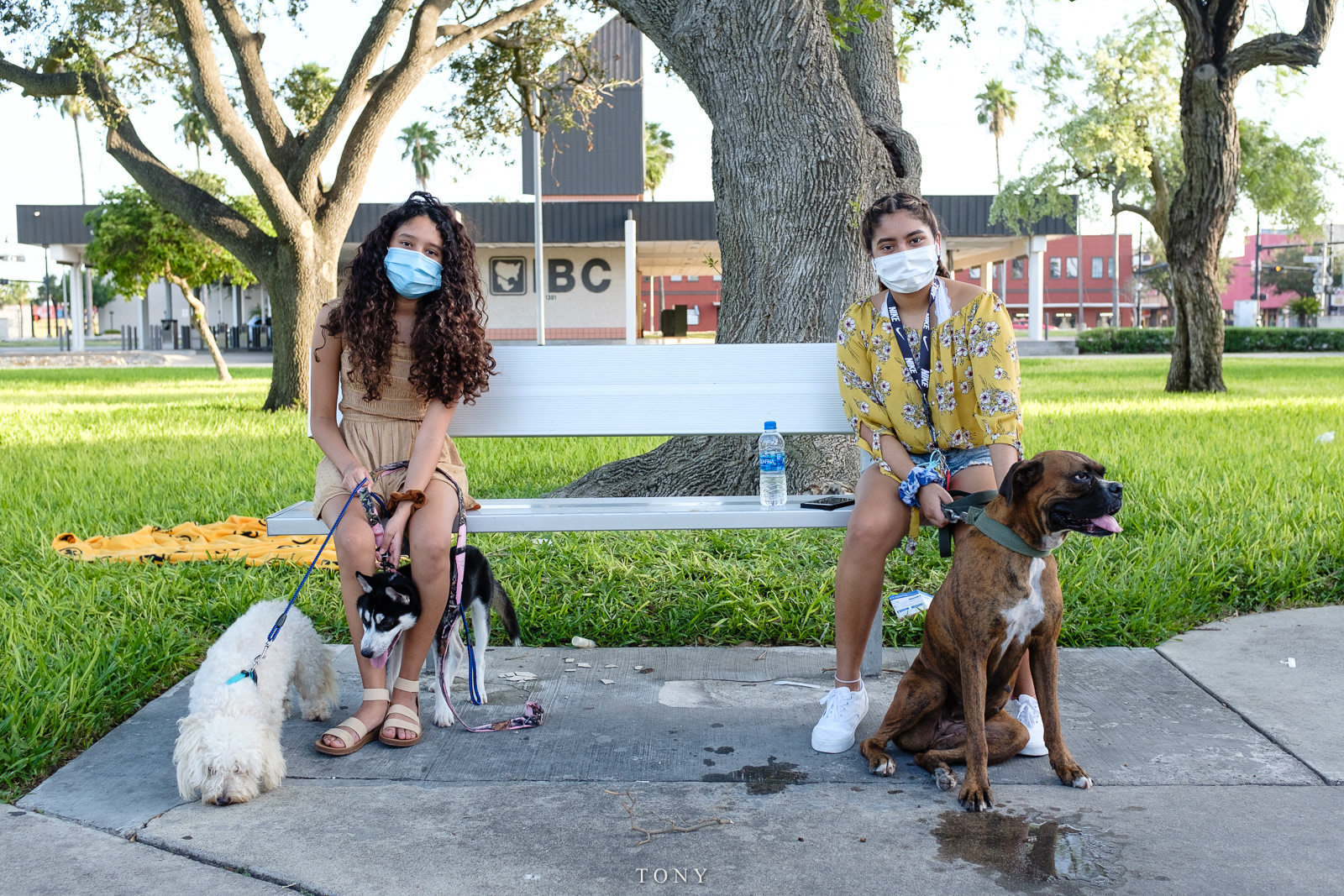 Sisters walk their dogs , McAllen, Texas, August 2020.