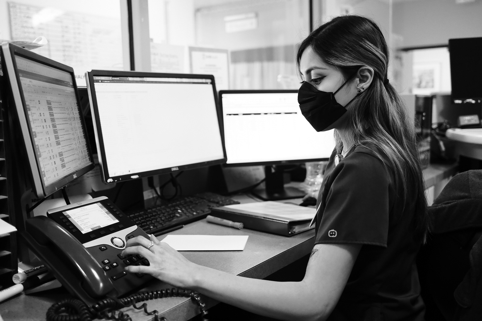 Fatima, Unit Clerk, answers and transfers calls for the E.R. department.