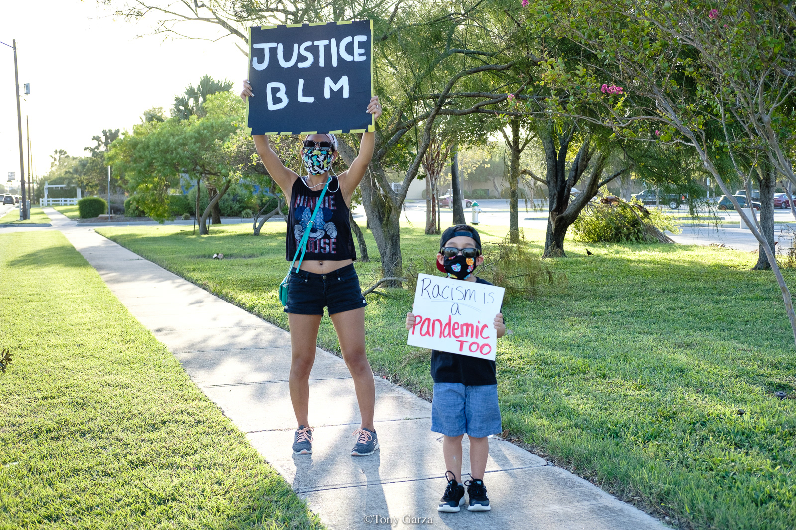 Mother and son take the streets to march for justice, McAllen, Texas, July 2020. 