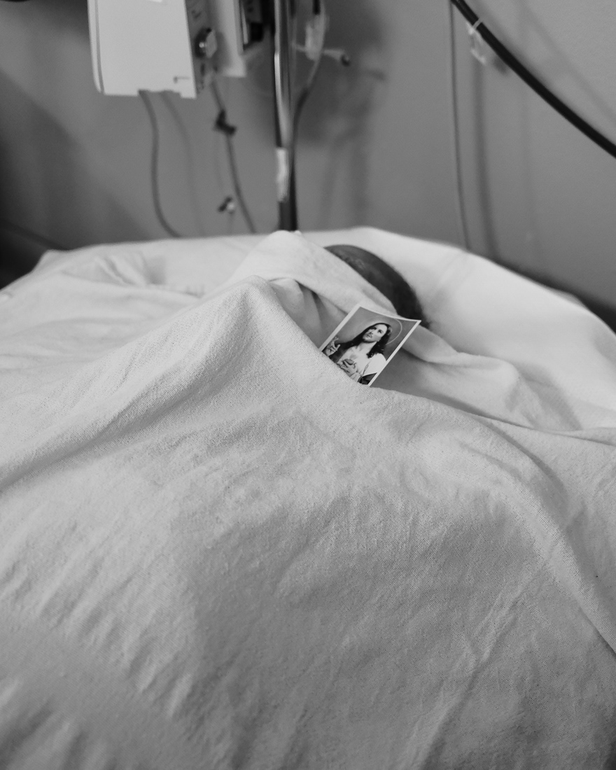 Newly Departed: A card of Jesus Christ is placed on top of the newly departed. A symbol for everyone in the hospital to know all efforts were exhausted. This soul has left this world.