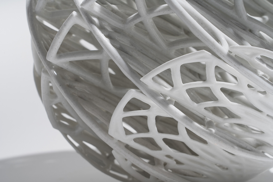 Slot Sphere, Porcelain, Cone 10, 8 x 8 x 8 in.