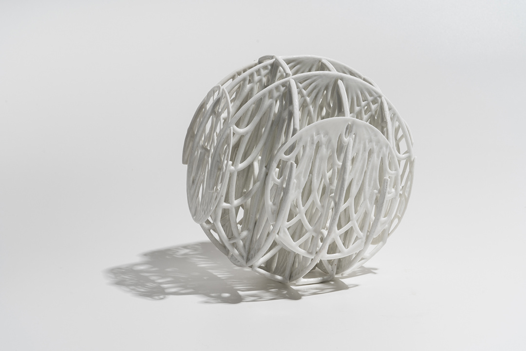Slot Sphere, Porcelain, Cone 10, 8 x 8 x 8 in.