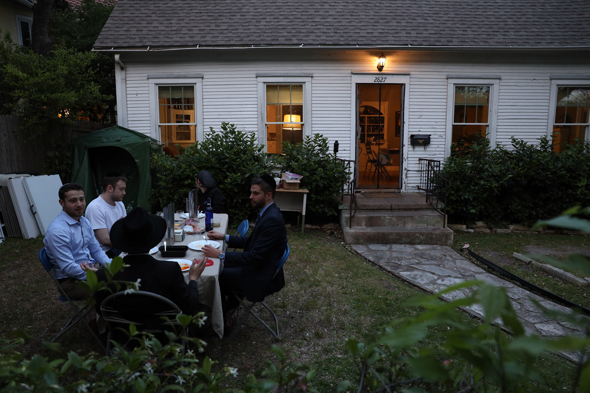 A household celebrates the last day of Passover during the Coronavirus pandemic on April 16, 2020.