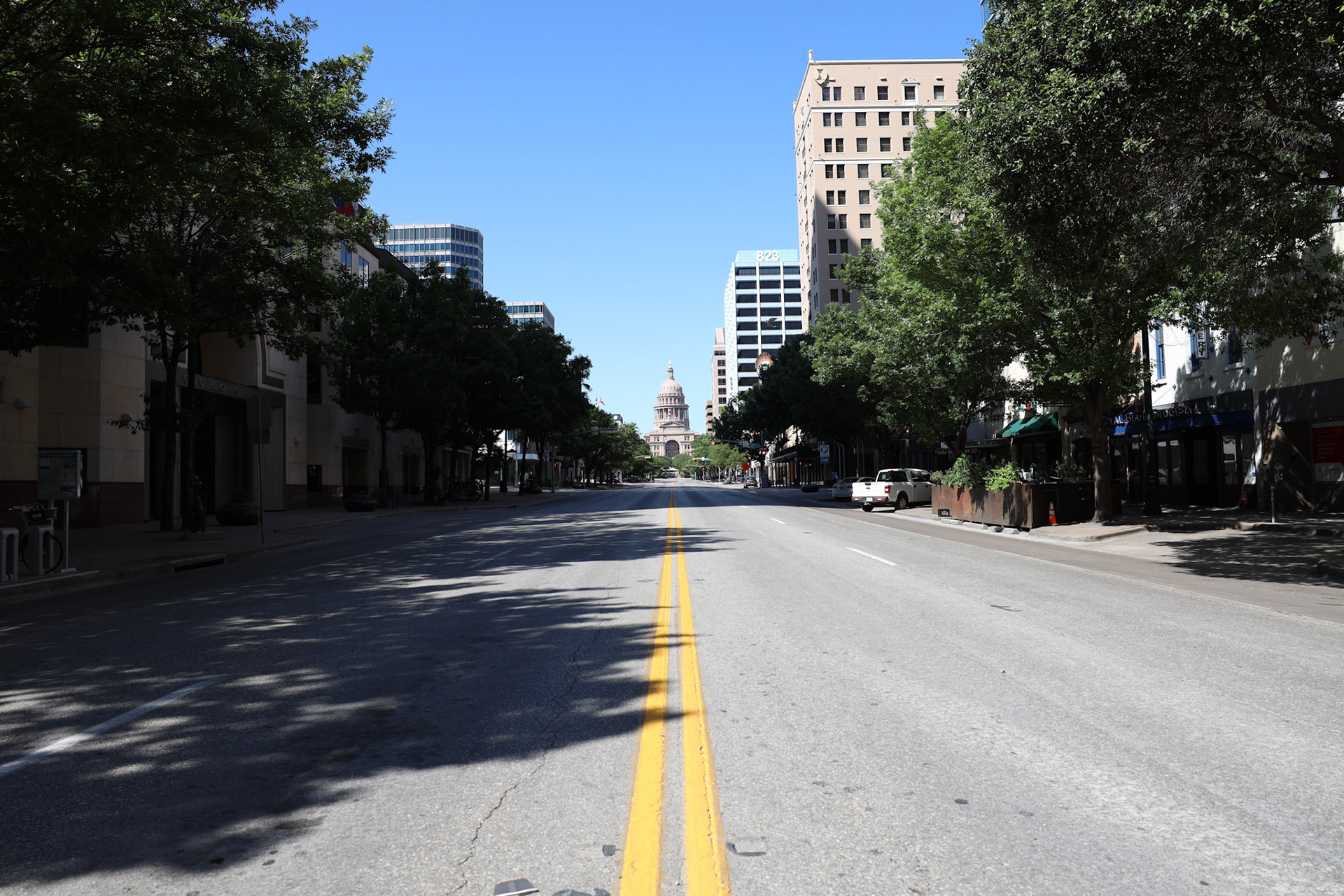 Congress Street in Austin, TX empty midday on April 14, 2020 during the shutdown to combat the spread of Coronavirus.