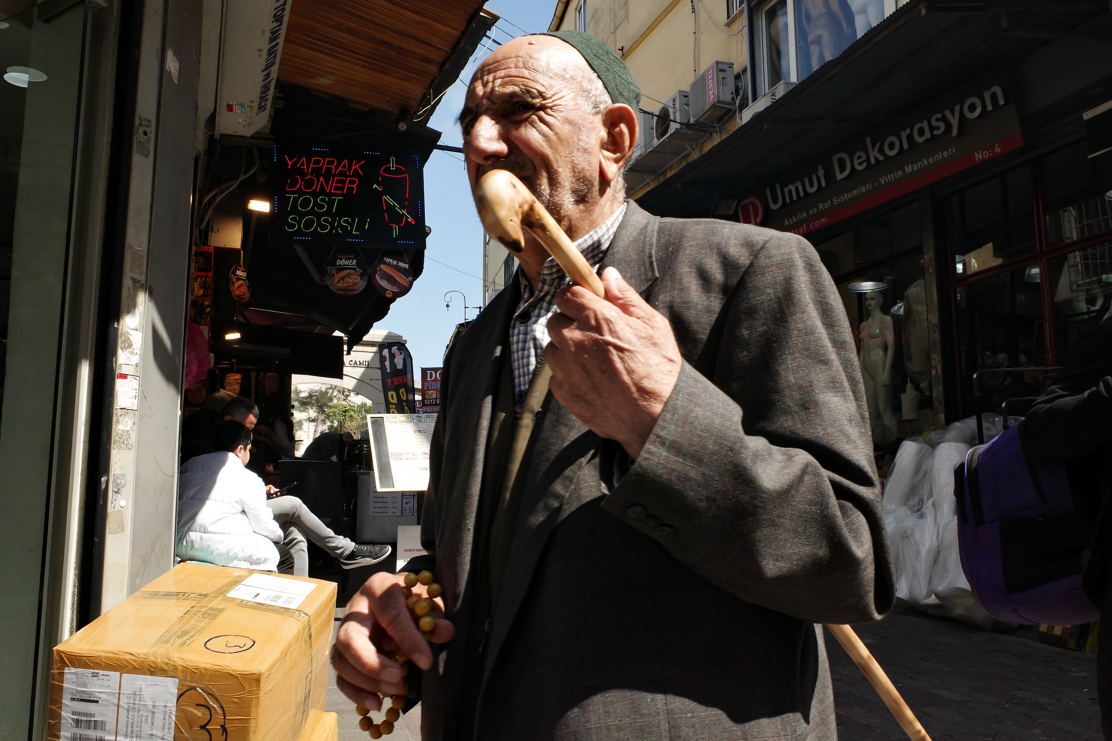 JUXTANBUL CANDID - Taken in Istanbul -nose- walking stick - juxtaposition