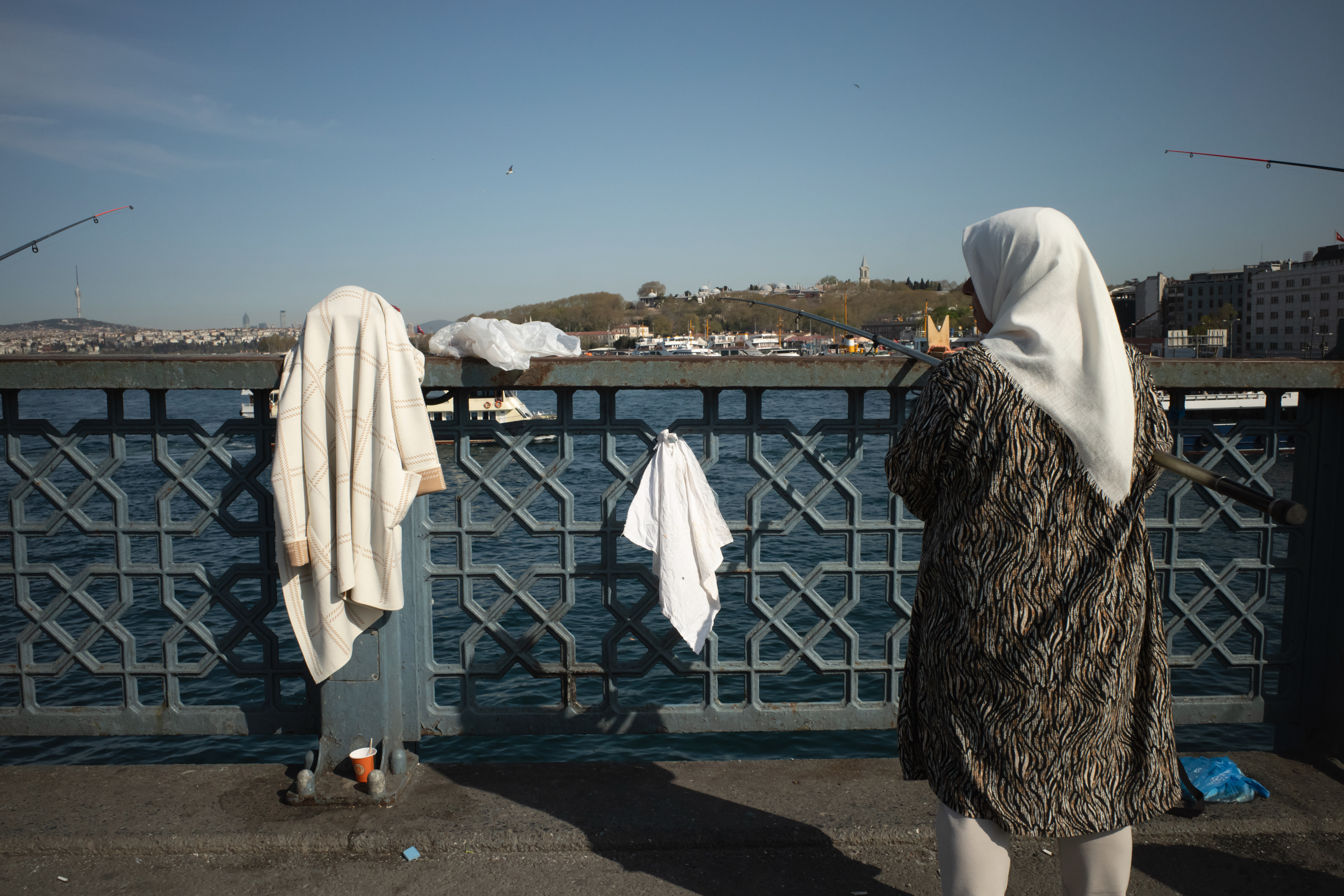 JUXTANBUL CANDID - Taken in Galata Bridge/Istanbul - fishing - juxtaposition
