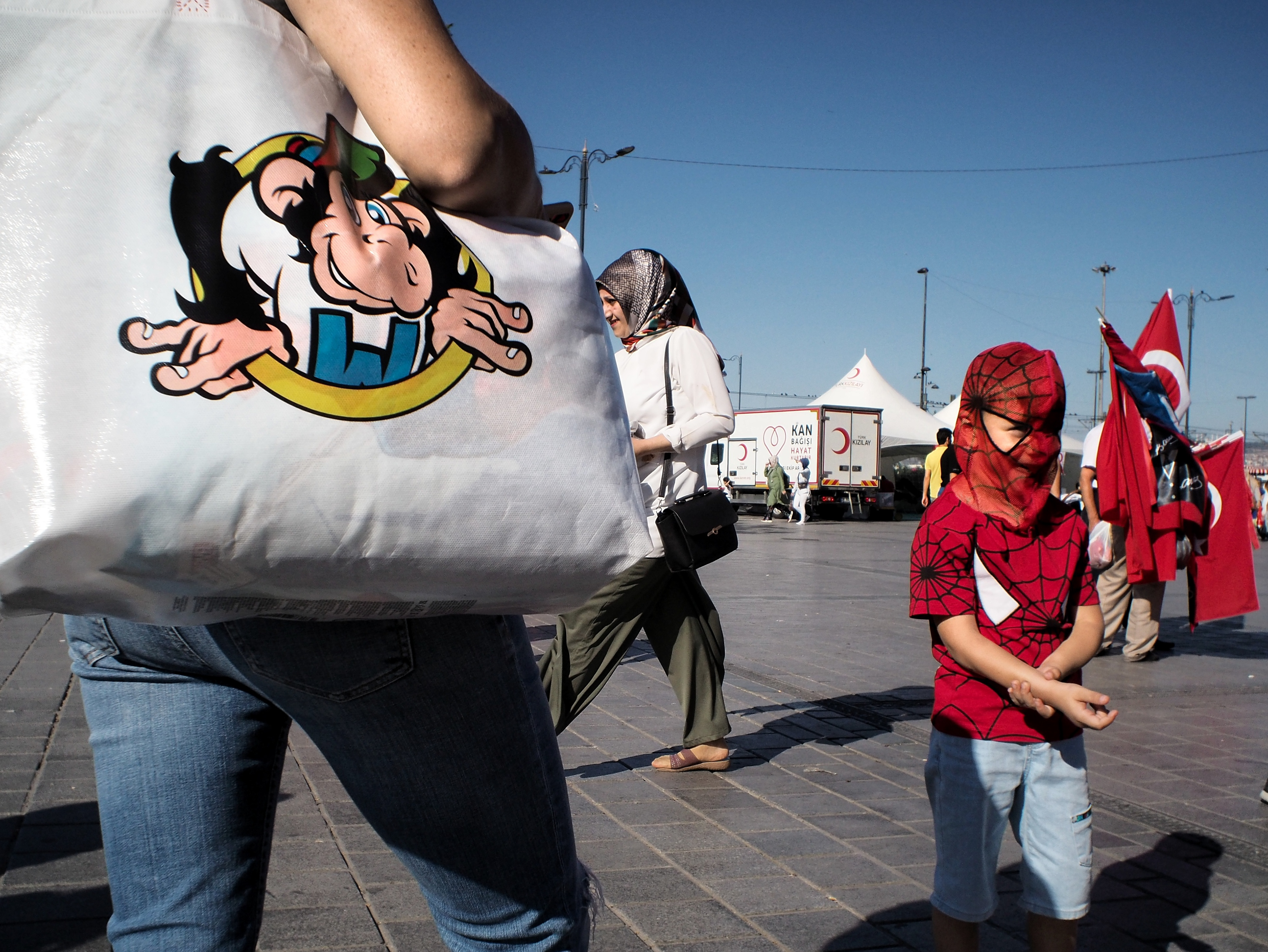 JUXTANBUL CANDID - Taken in Eminonu/Istanbul- pigeons - spiderman - new mosque- juxtaposition