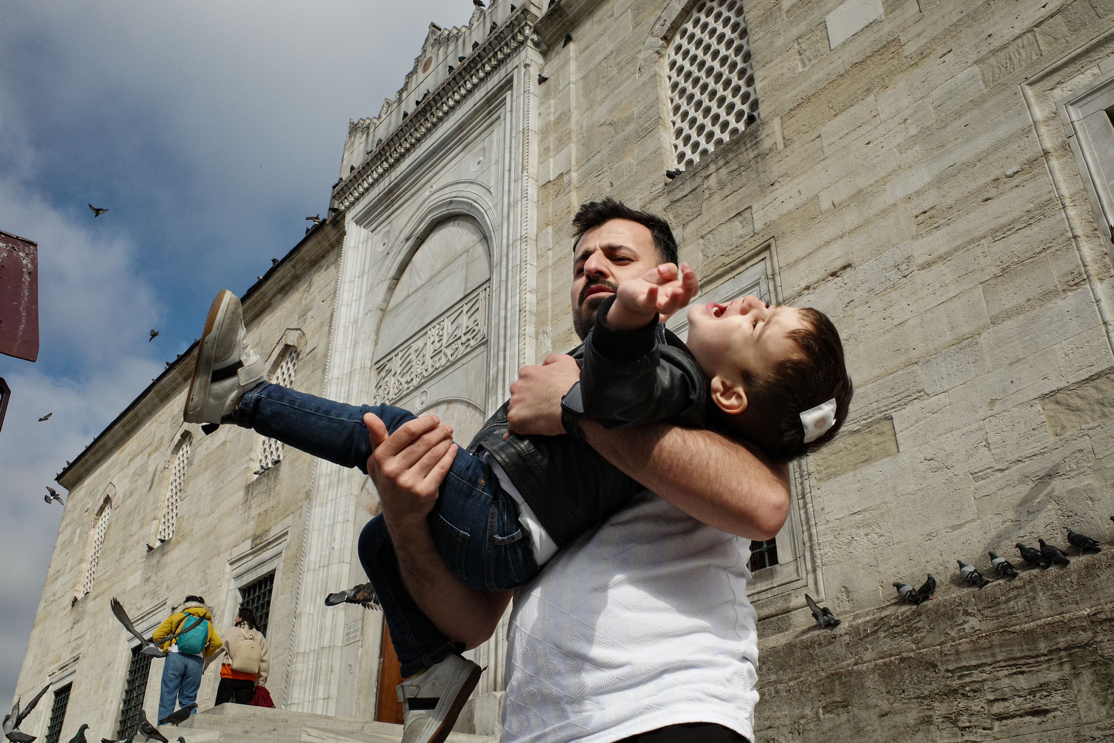 JUXTANBUL CANDID - Taken in Eminonu/Istanbul - new mosque - people action - pigeons- juxtaposition