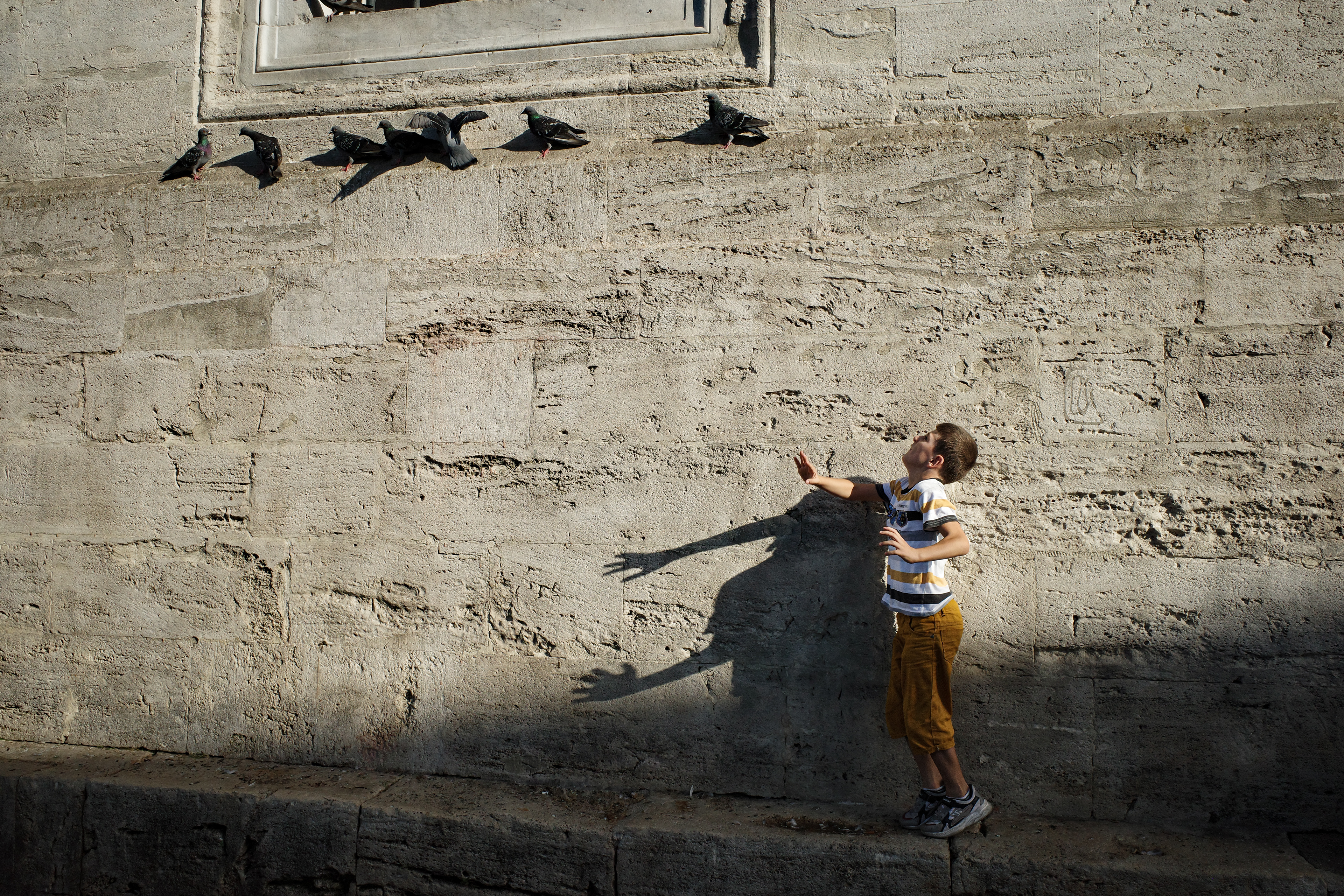JUXTANBUL CANDID - Taken in Eminonu/Istanbul - new mosque - shadow - pigeons- juxtaposition